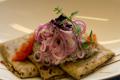 Buckwheat pancakes with mushrooms and pickled onions