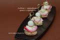 Canapés of herring with potatoes and pickled onions